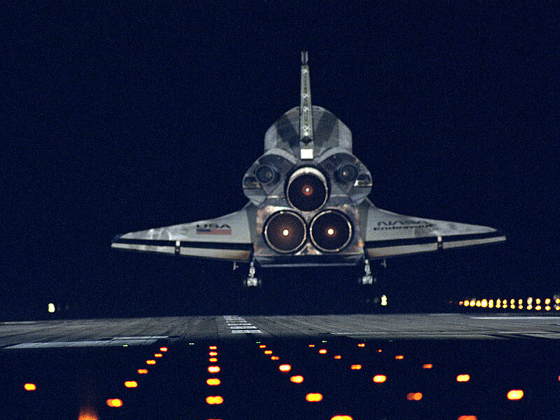 Space shuttle landing at night