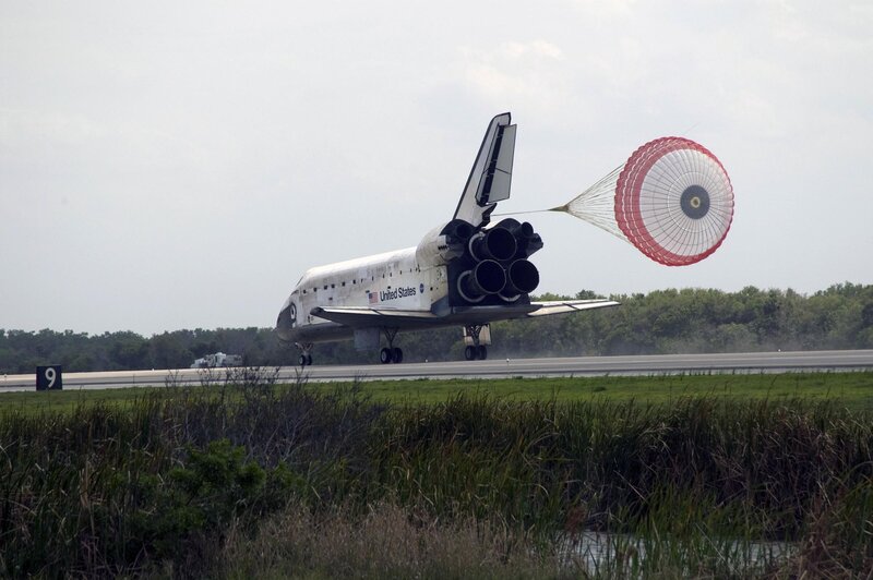 Space shuttle landing with parachute