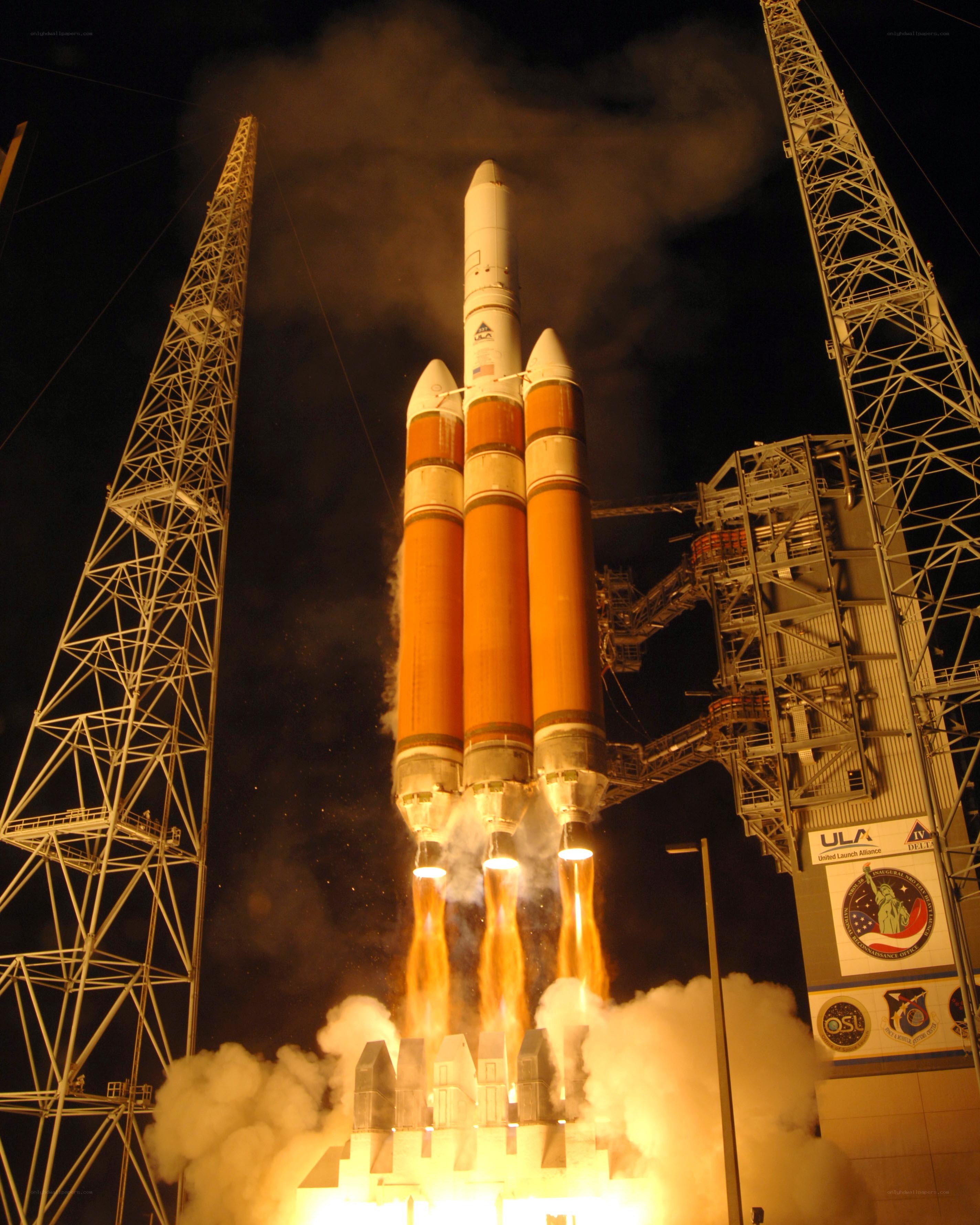 Space shuttle launch at night