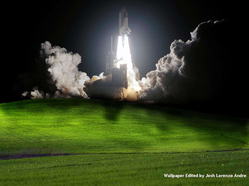 Space shuttle launch at night