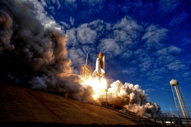 Space Shuttle Launch — Blue, Dramatic, Afternoon, Photograph, Smoke, Clouds, Water Tower, White
