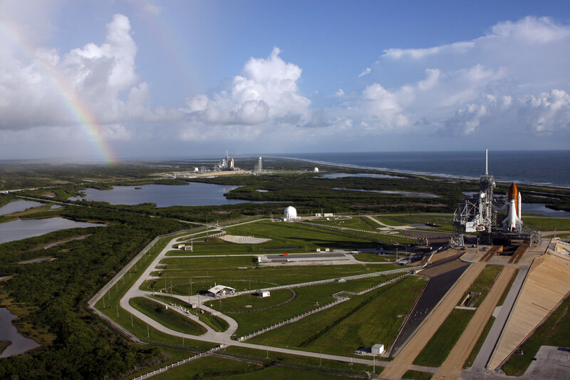 Space shuttle launch site with rainbow