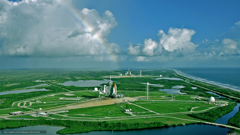 Space shuttle launch site with rainbow