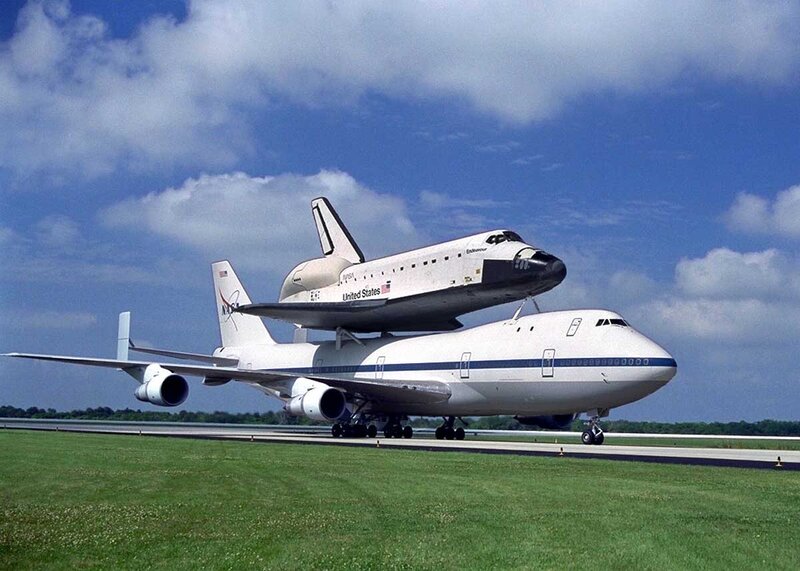 Space Shuttle on Airplane — White, Calm, Afternoon, Photograph