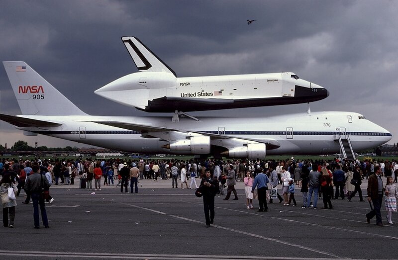 Space Shuttle on Airplane — White, Dramatic, Afternoon, Photograph, Crowd