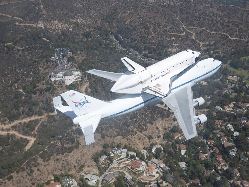 Space Shuttle on Airplane — White, Dramatic, Afternoon, Photograph, Mountains