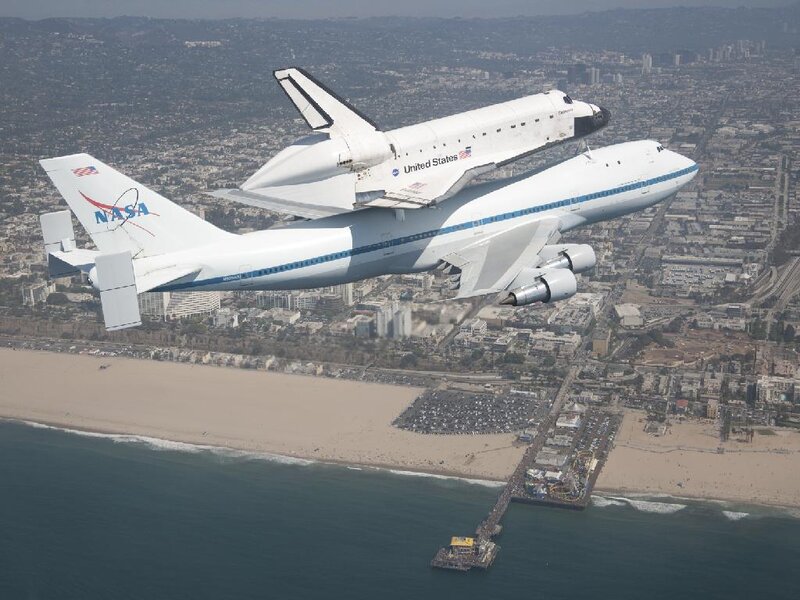 Space Shuttle on Airplane — White, Dramatic, Afternoon, Photograph