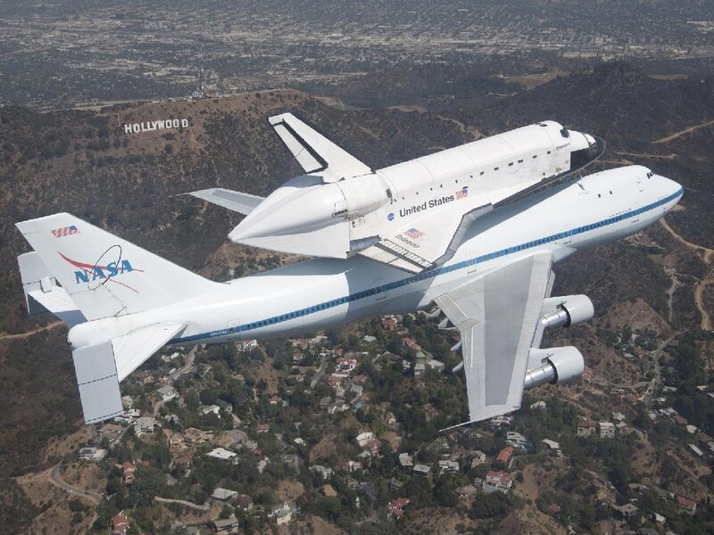 Space Shuttle on Airplane — White, Dramatic, Afternoon