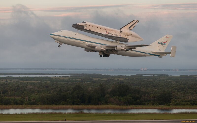 Space Shuttle on Airplane — White, Dramatic, Sunset, Photograph