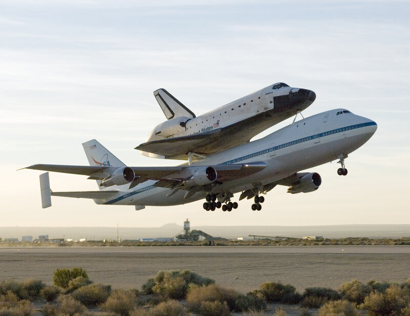 Space Shuttle on Airplane — White, Dramatic, Sunset