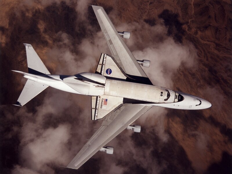 Space Shuttle on Carrier Aircraft — White, Dramatic, Photograph
