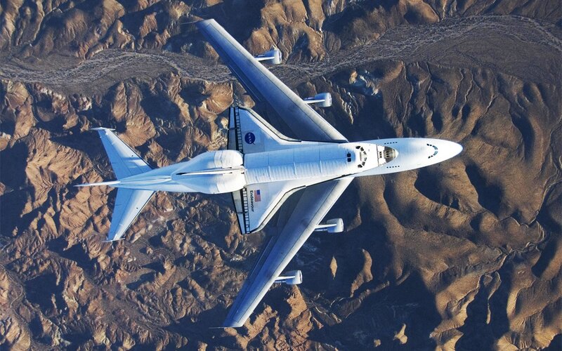 Space Shuttle on Carrier Aircraft — White, Dramatic