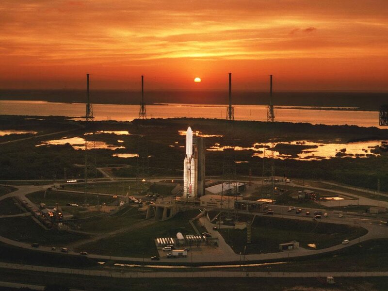 Space shuttle on launch pad at sunset