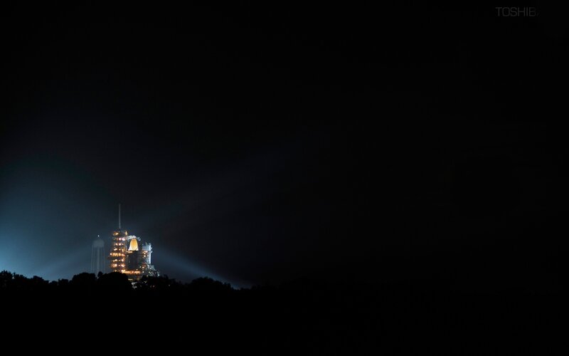 Space Shuttle on Launch Pad — Black, Dramatic, Night, Photograph, Launch Tower, Spotlights, Silhouetted Trees