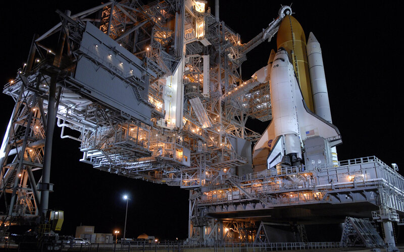 Space Shuttle on Launch Pad — White, Dramatic, Night, Photograph, Launch Tower, External Tank