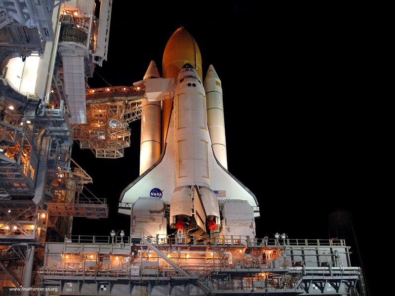 Space Shuttle on Launch Pad — White, Dramatic, Night