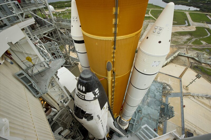 Space Shuttle on Launch Pad — White, Industrial, Afternoon