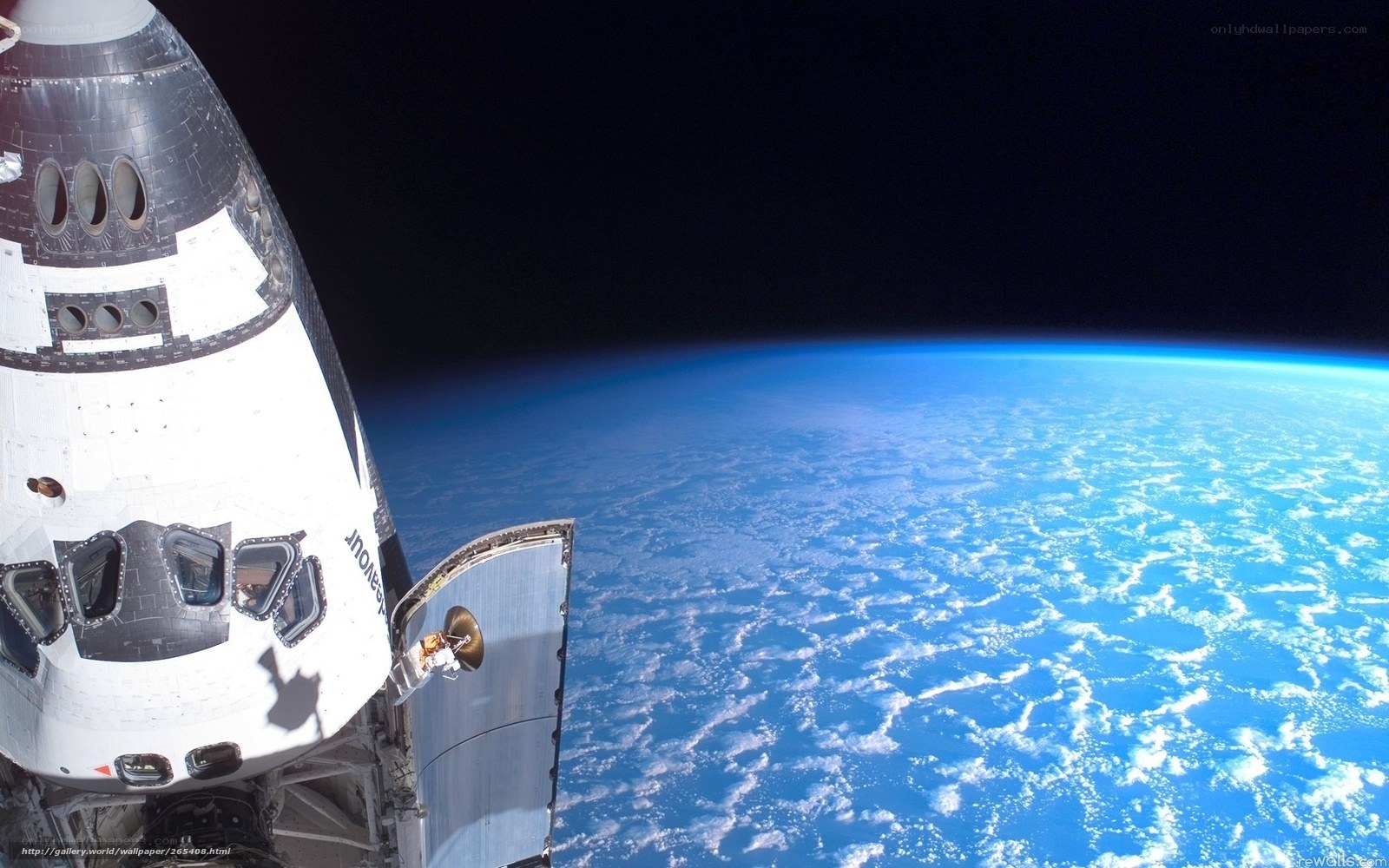 Space shuttle over Earth