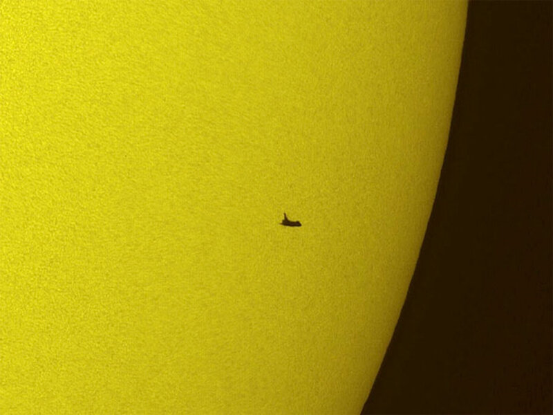 Space shuttle transiting the sun