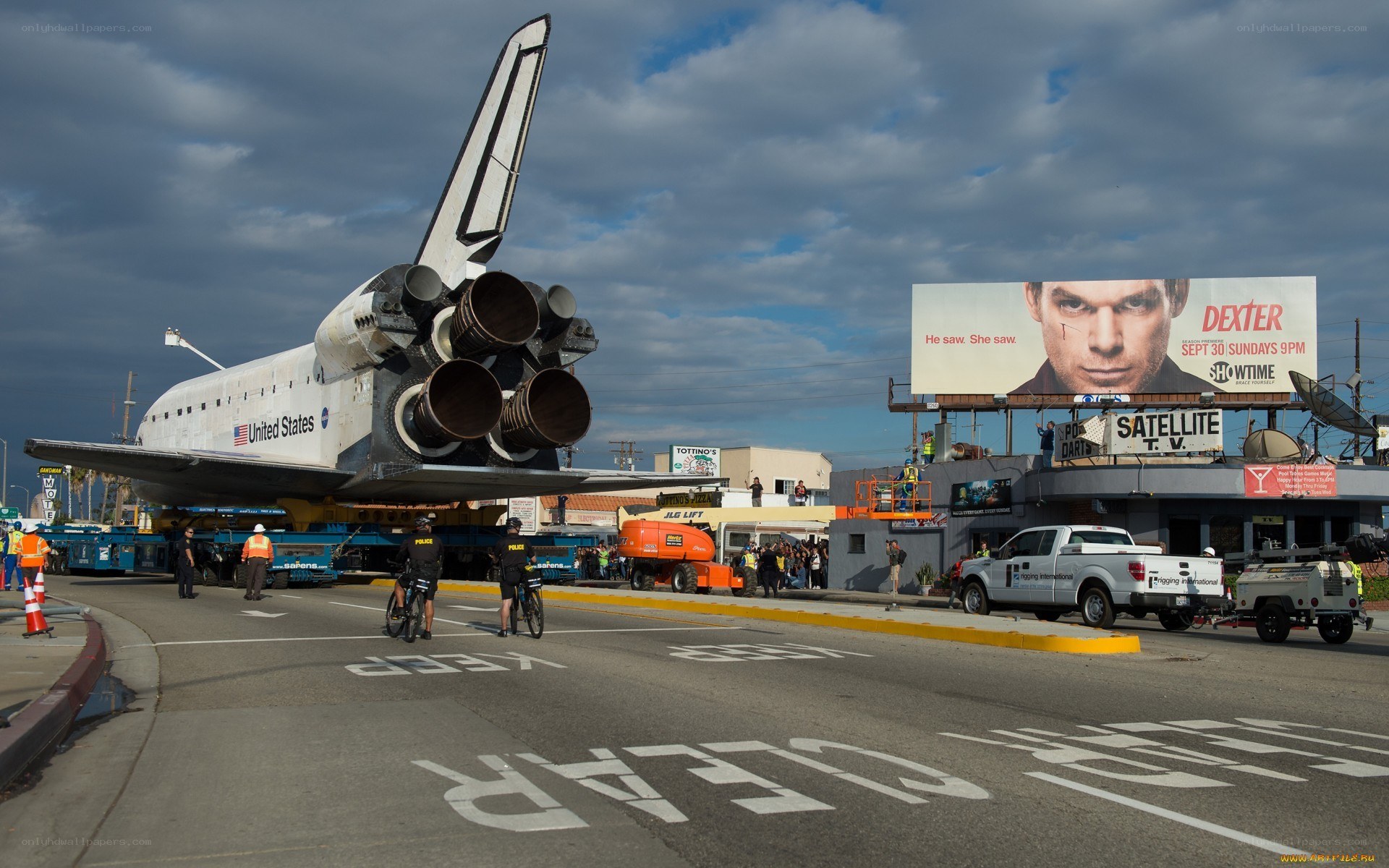 Space shuttle transport on city street
