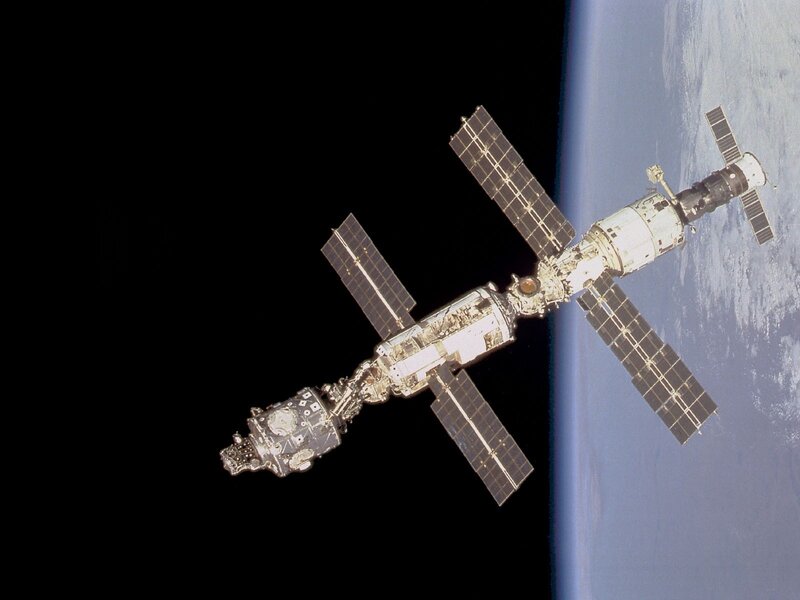 Space Station in Orbit — Black, Dramatic, Photograph, Earth