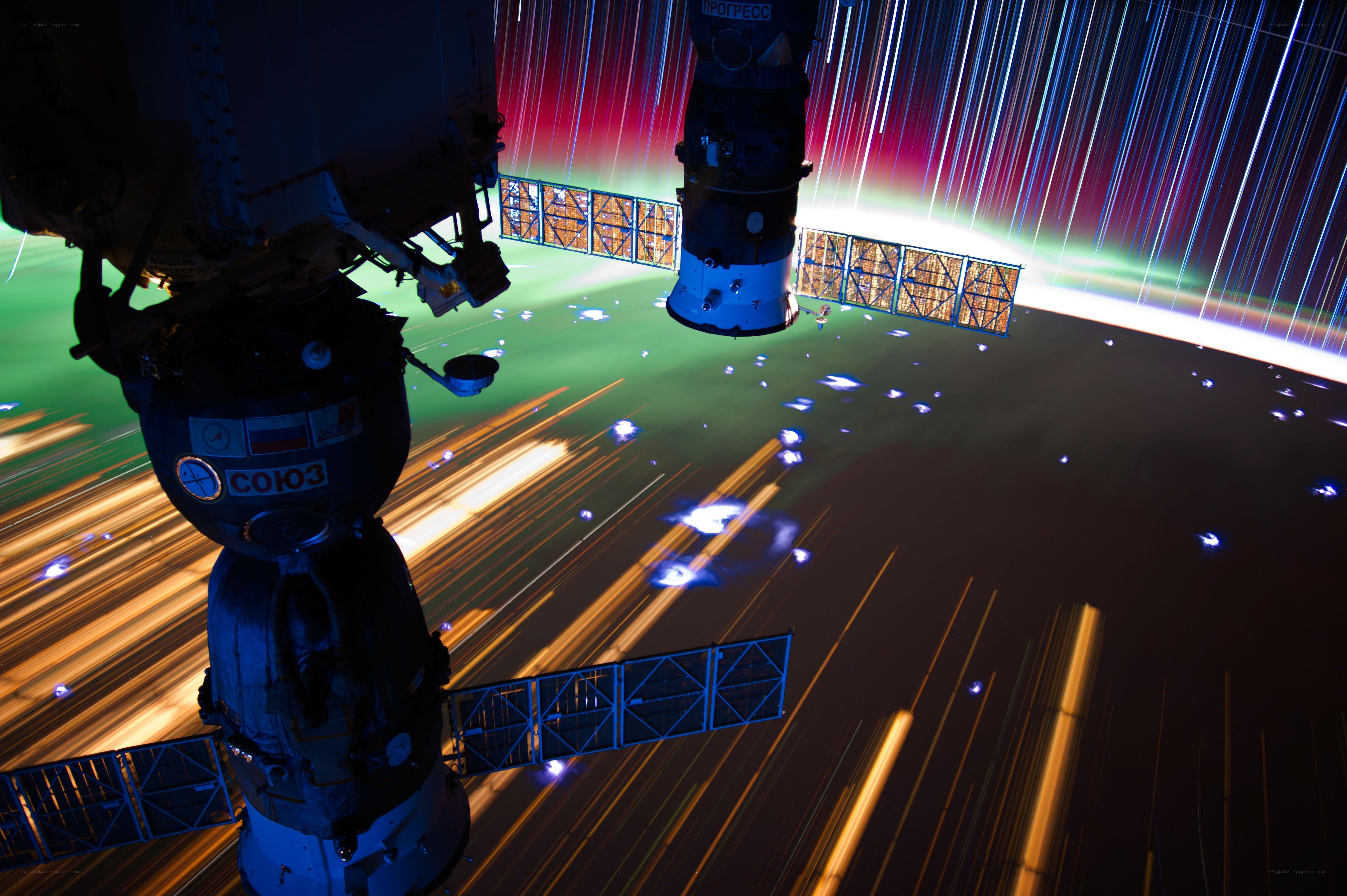 Space station over Earth at night