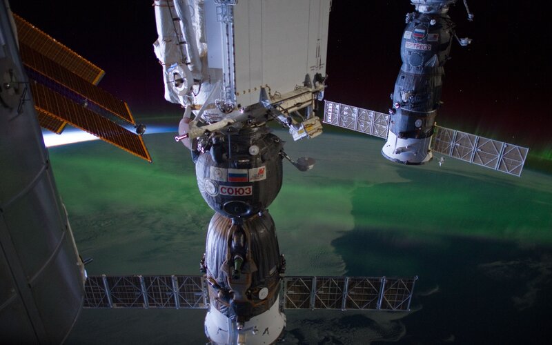 Space station with aurora
