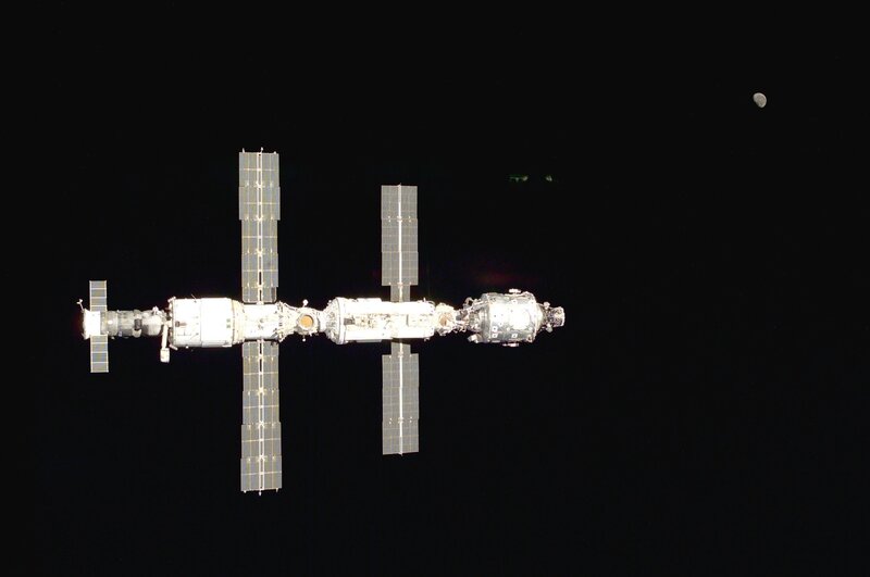 Space station with moon in background