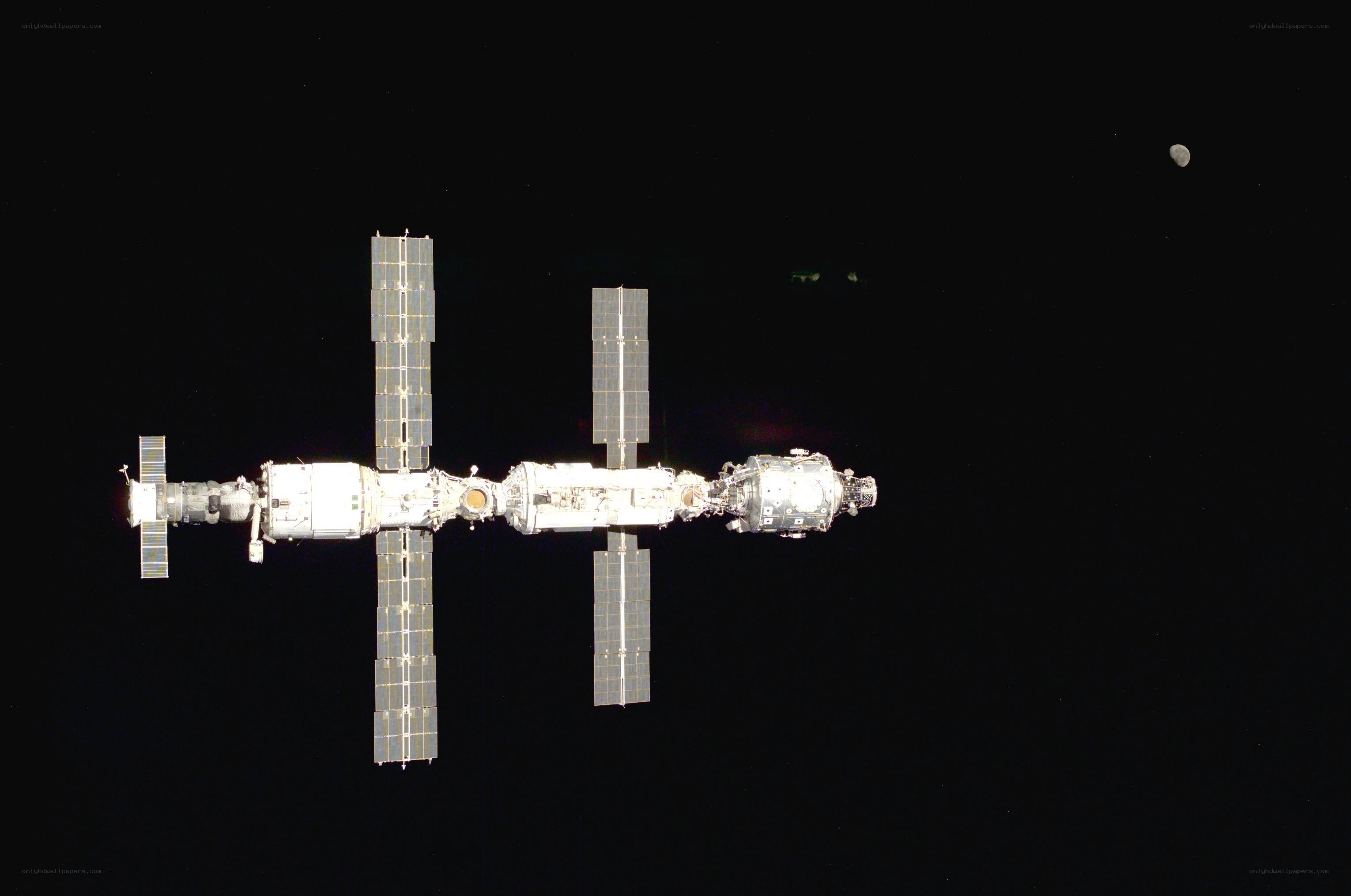 Space station with moon in background