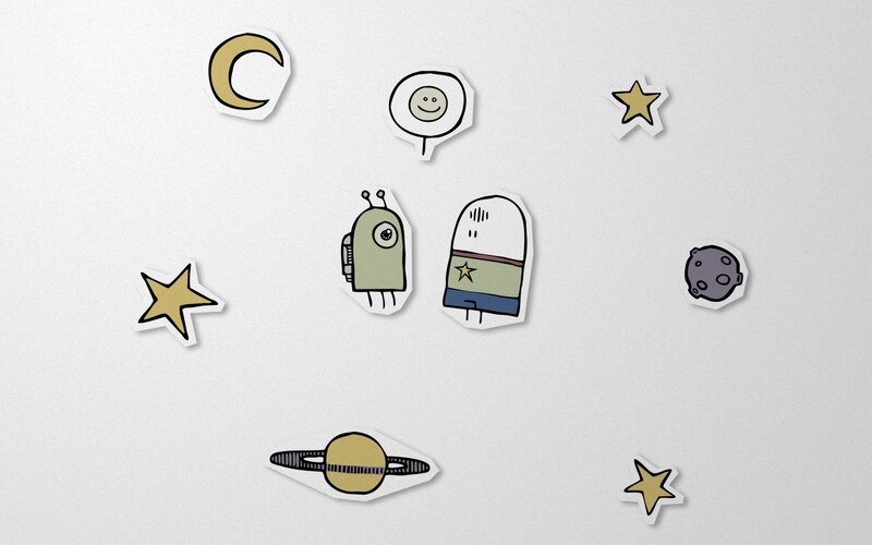 space-themed stickers on white surface