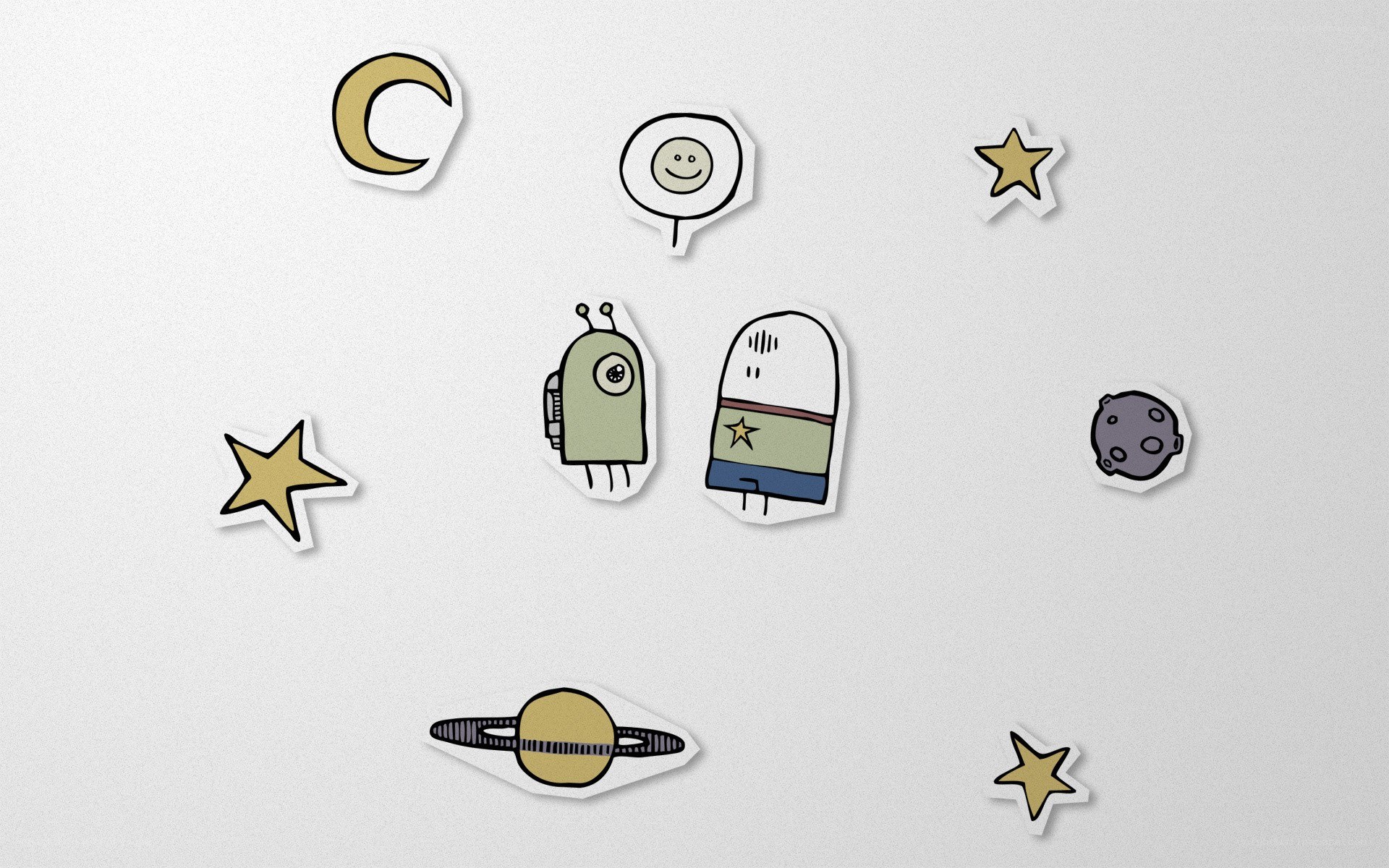space-themed stickers on white surface
