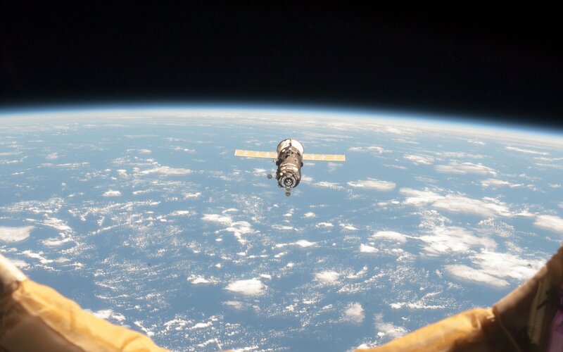 Spacecraft Above Earth — Blue, Serene