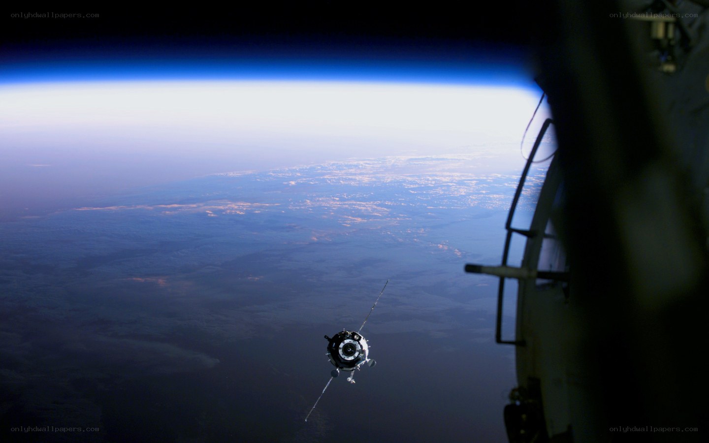 Spacecraft docking over Earth