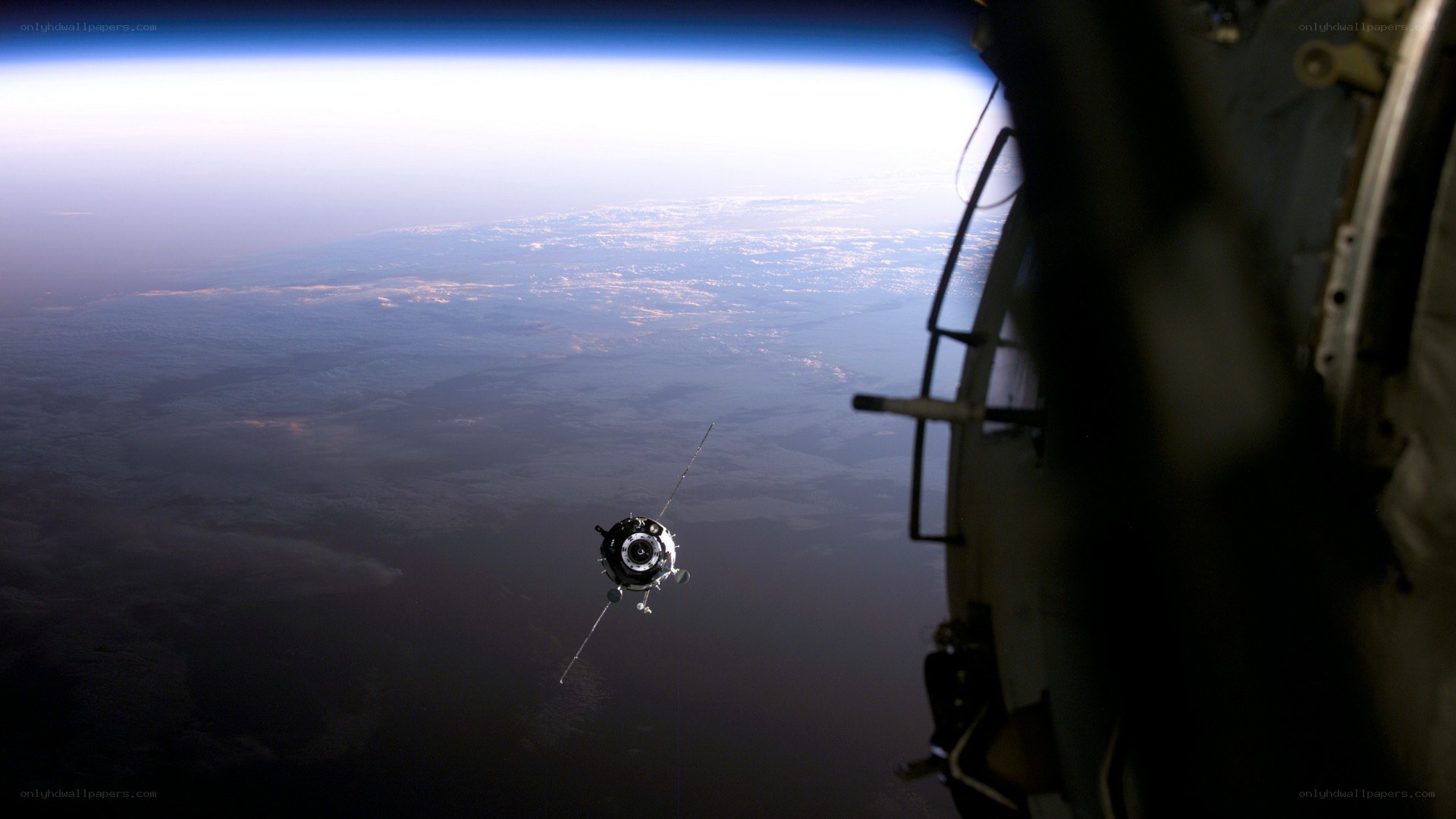 Spacecraft docking with station