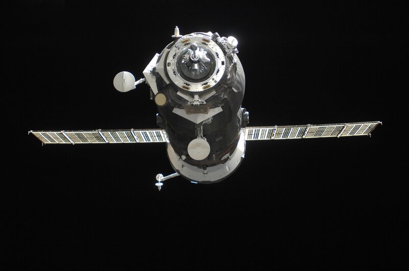 Spacecraft in Orbit — Black, Dramatic, Night, Photograph, Solar Panels