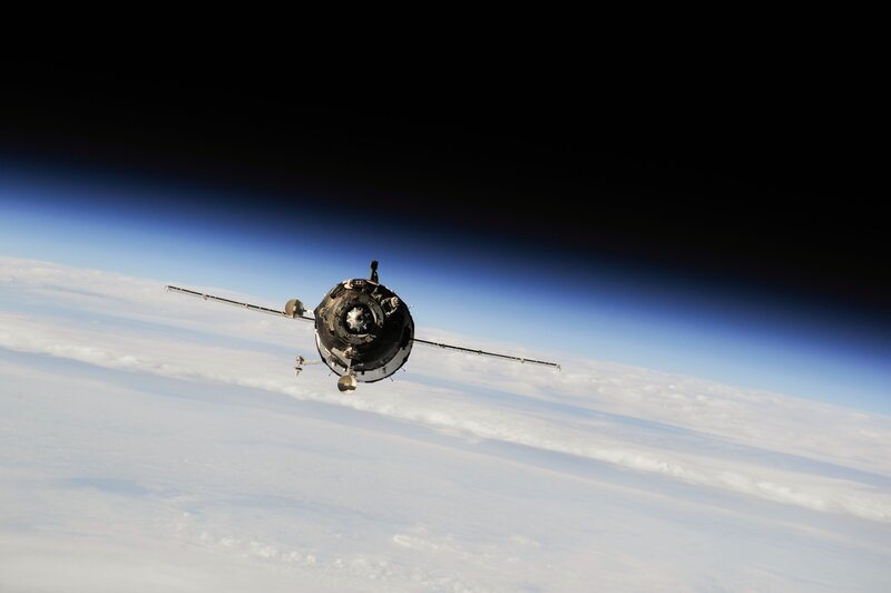 Spacecraft in Orbit — Blue, Serene, Photograph, Earth, Clouds, Space