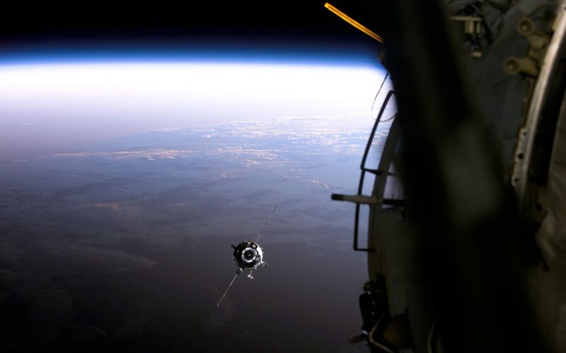 Spacecraft in Orbit — Blue, Serene, Photograph, Earth