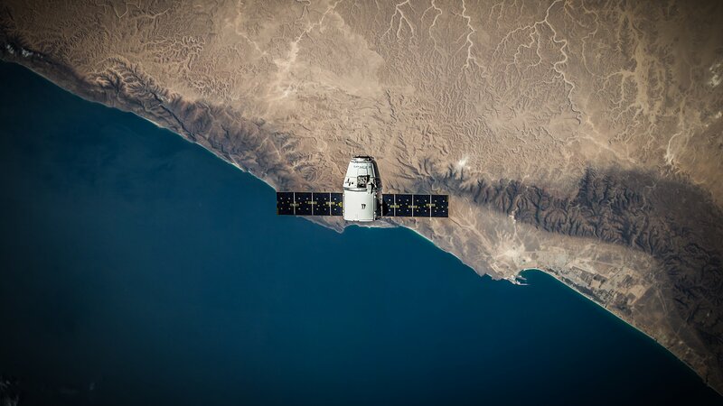 Spacecraft in Orbit — Blue, Serene, Photograph, Solar Panels