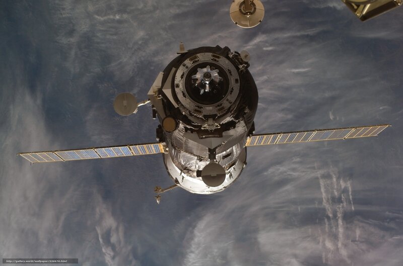 Spacecraft in Orbit — Blue, Serene, Photograph