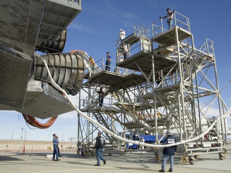 Spacecraft maintenance team at work