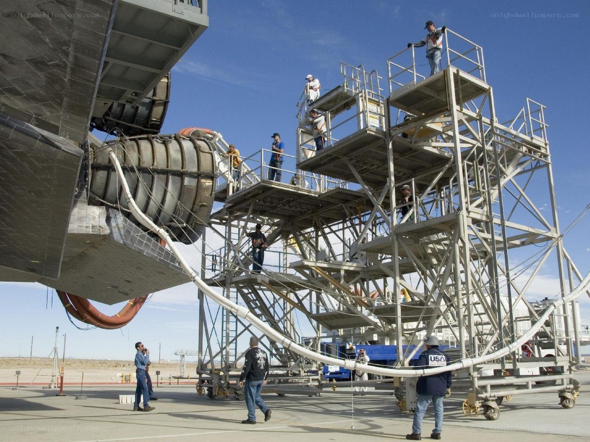 Spacecraft maintenance team at work