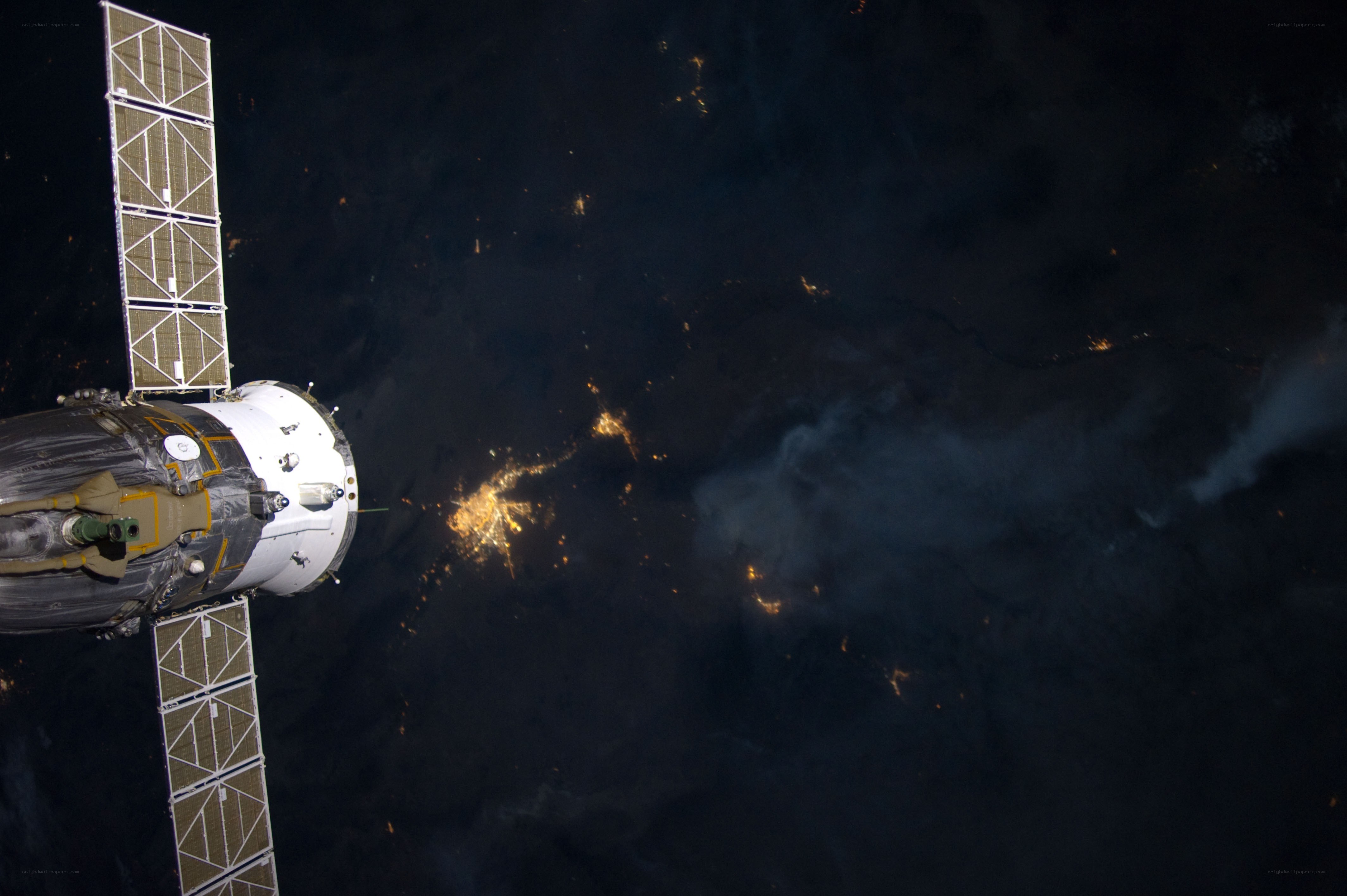 Spacecraft over Earth at night