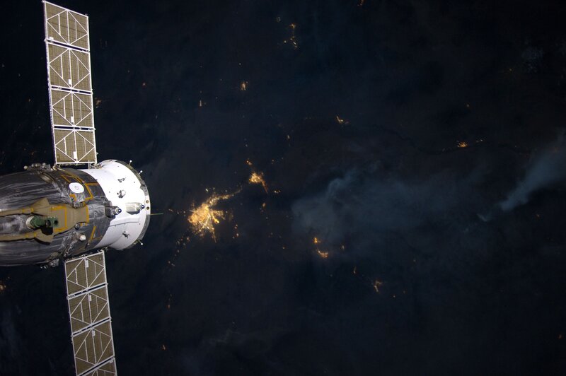 Spacecraft over Earth — Black, Dramatic