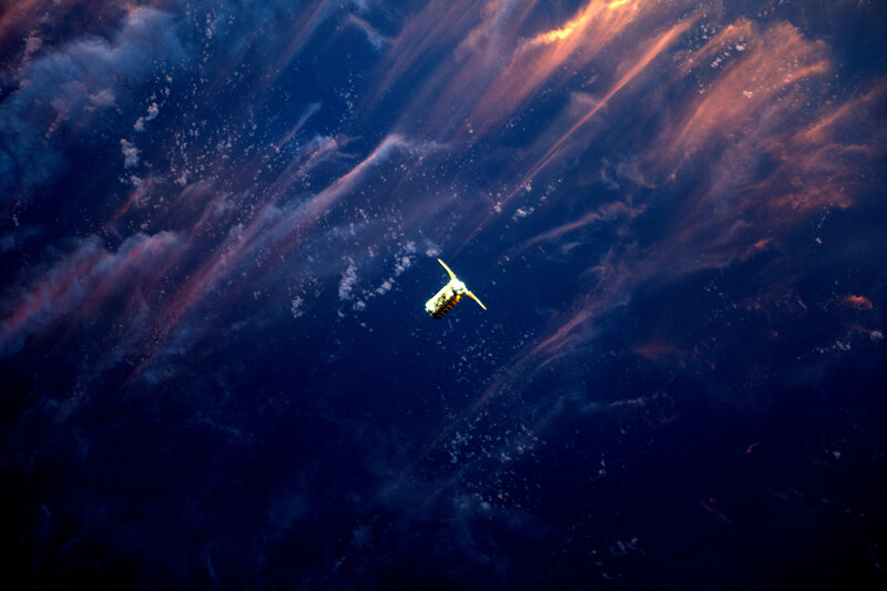 Spacecraft over Earth — Blue, Dramatic, Sunset