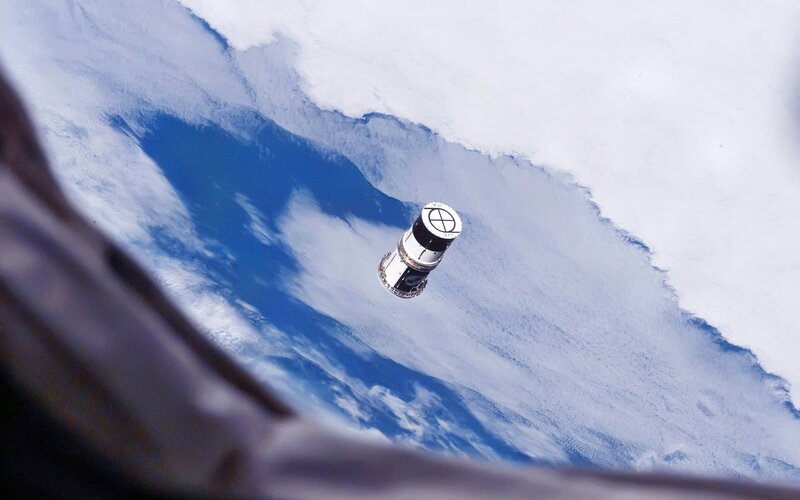 Spacecraft over Earth — Blue