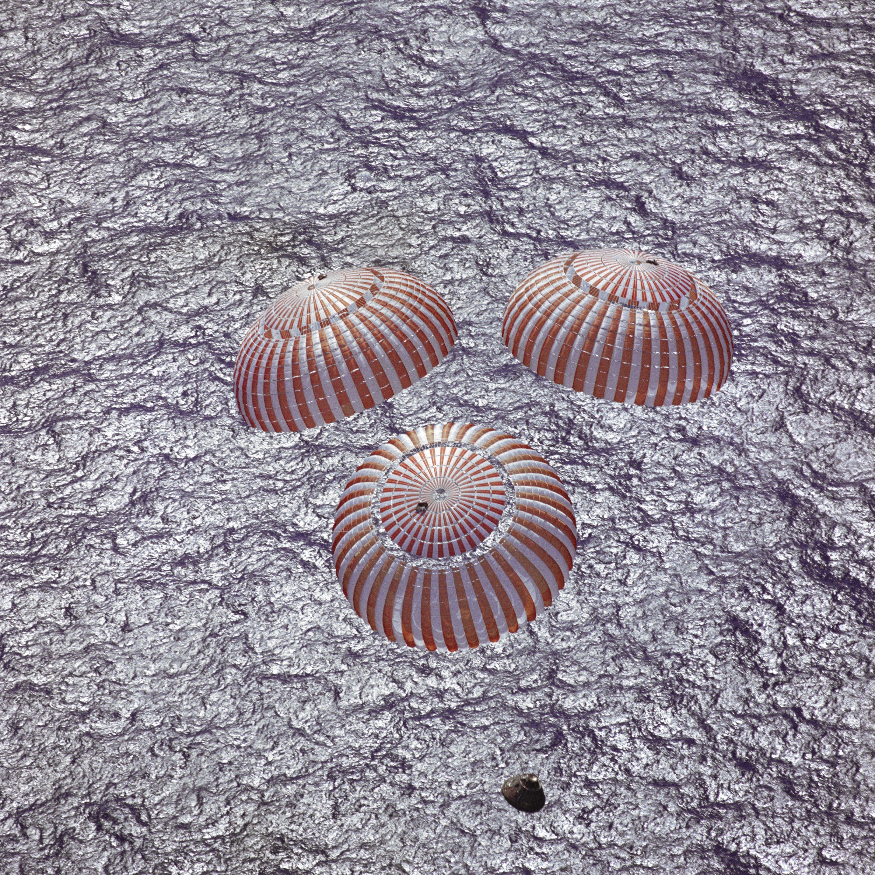 Spacecraft parachutes in ocean