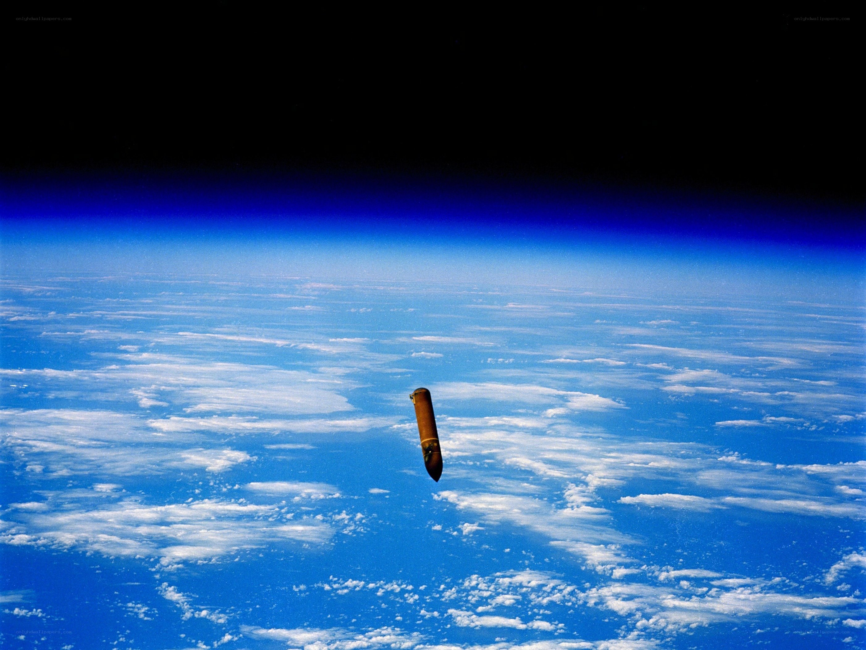 Spacecraft re-entry over Earth
