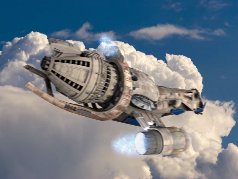 spaceship flying through clouds