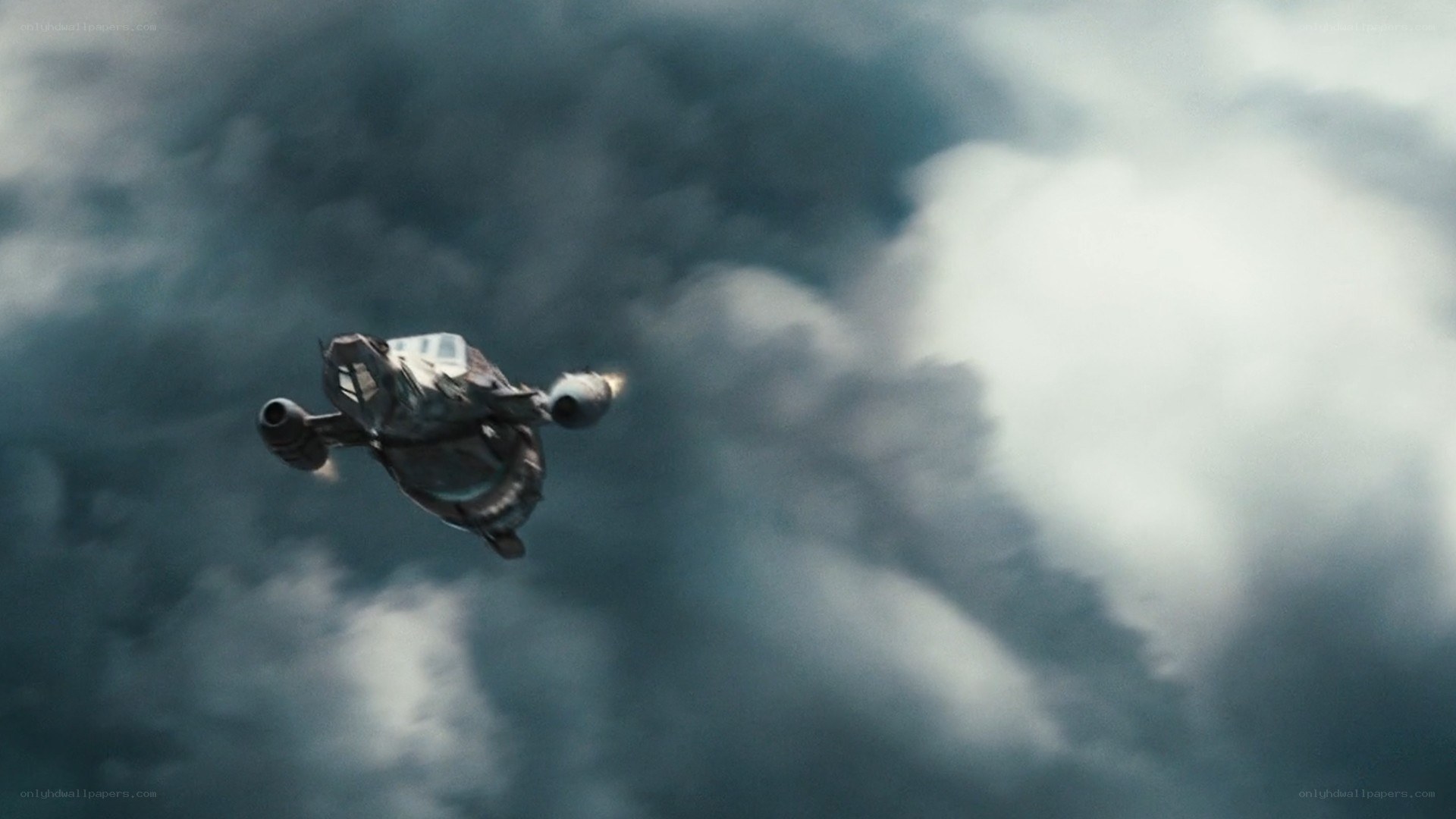 spaceship flying through clouds