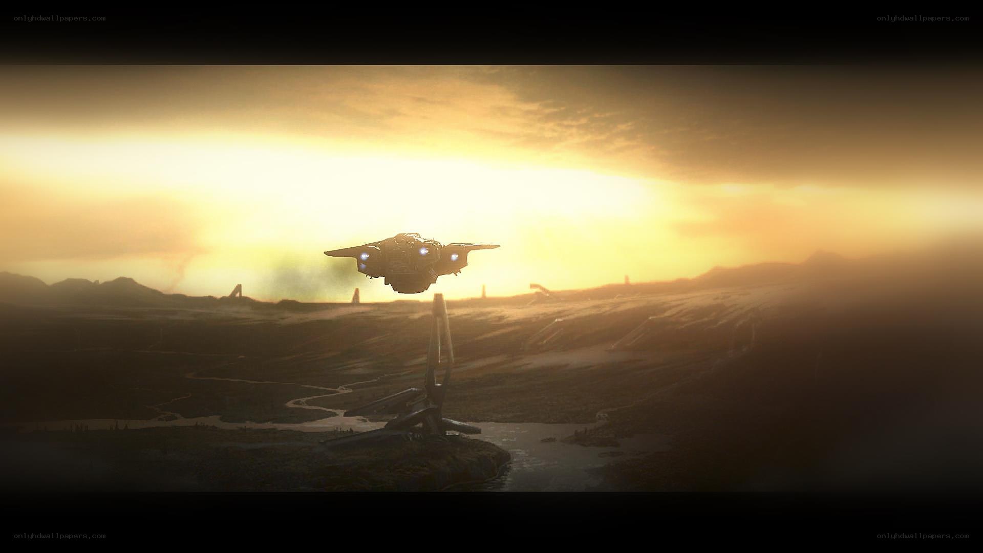 spaceship landing at sunset